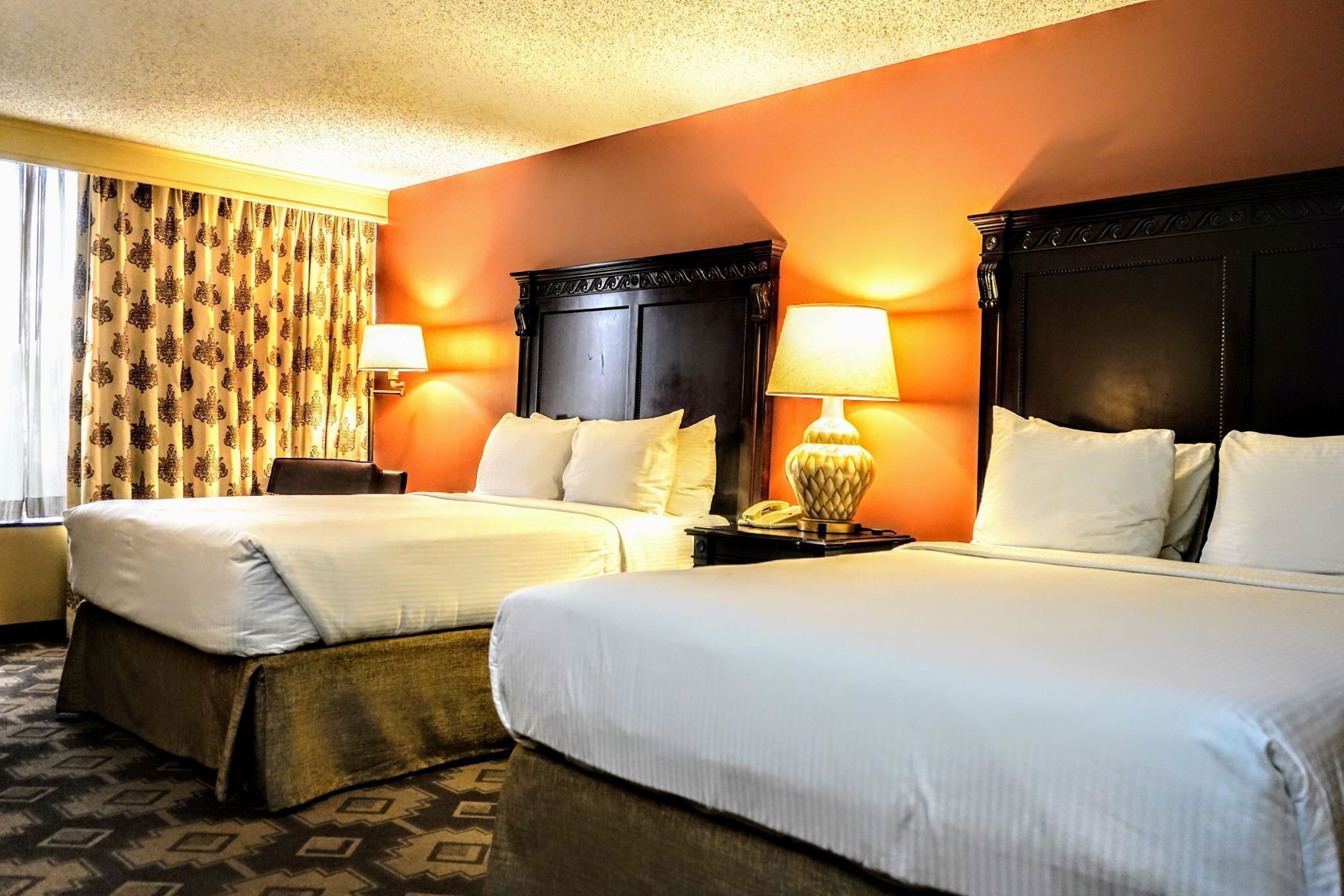 Premium bedding, down comforters, in-room safe, desk