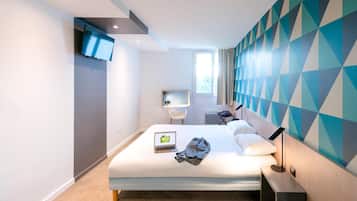 Blackout drapes, soundproofing, iron/ironing board, free WiFi