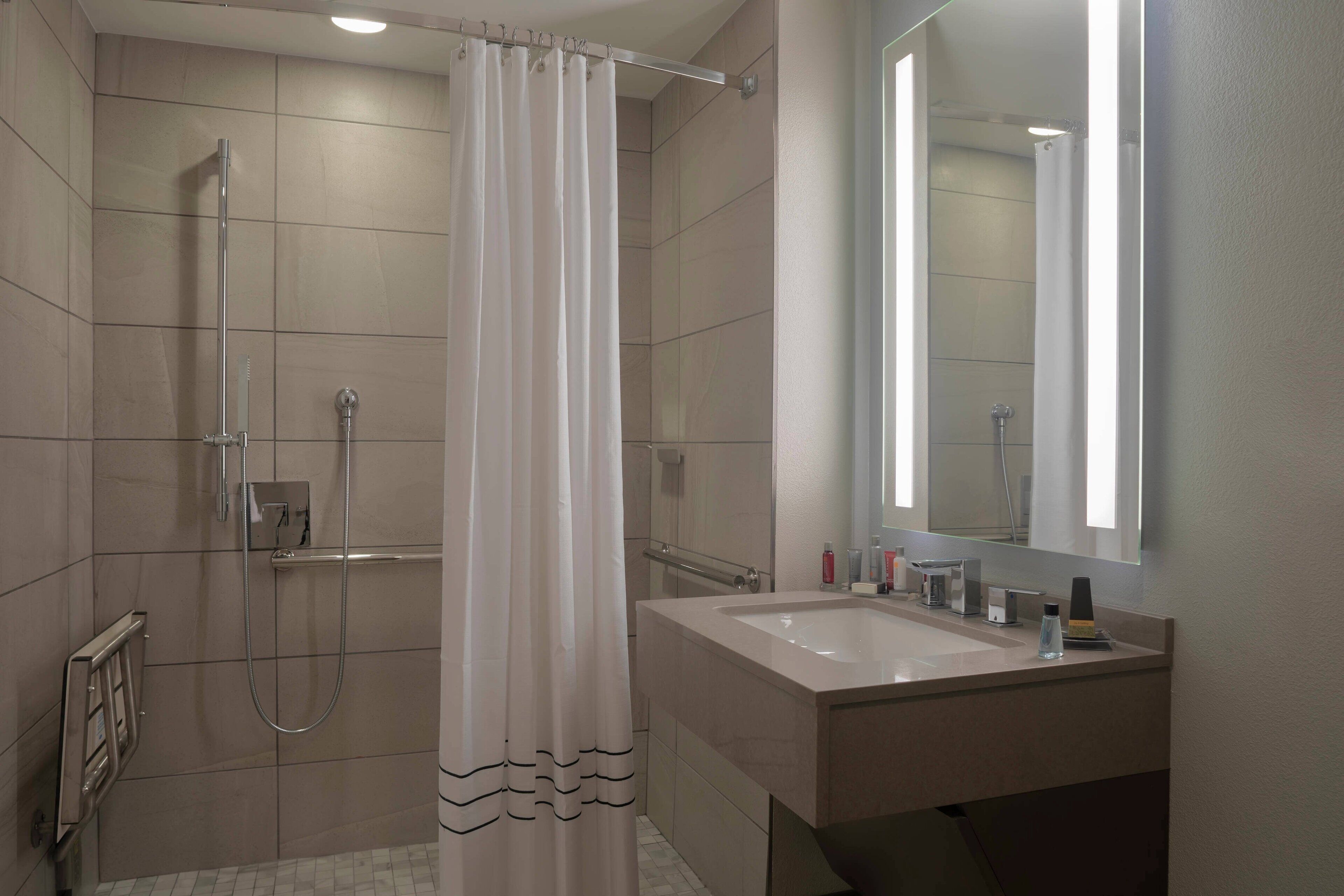 combined shower/bathtub, free toiletries, hair dryer, towels