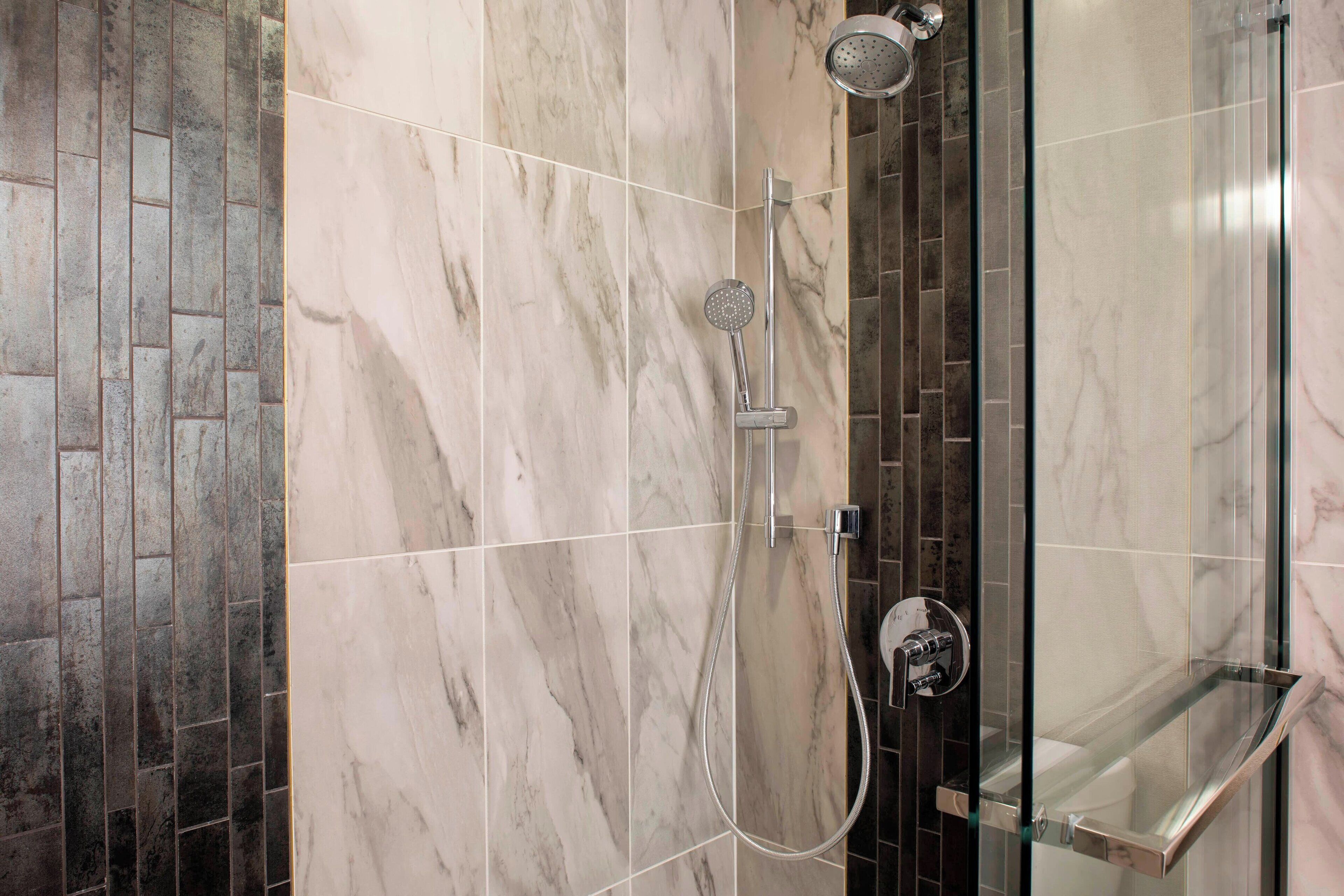 combined shower/bathtub, free toiletries, hair dryer, towels