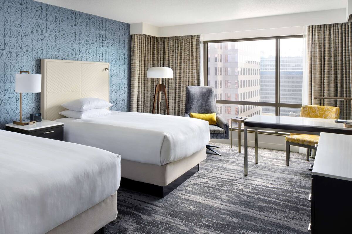 Premium bedding, down comforters, pillowtop beds, in-room safe