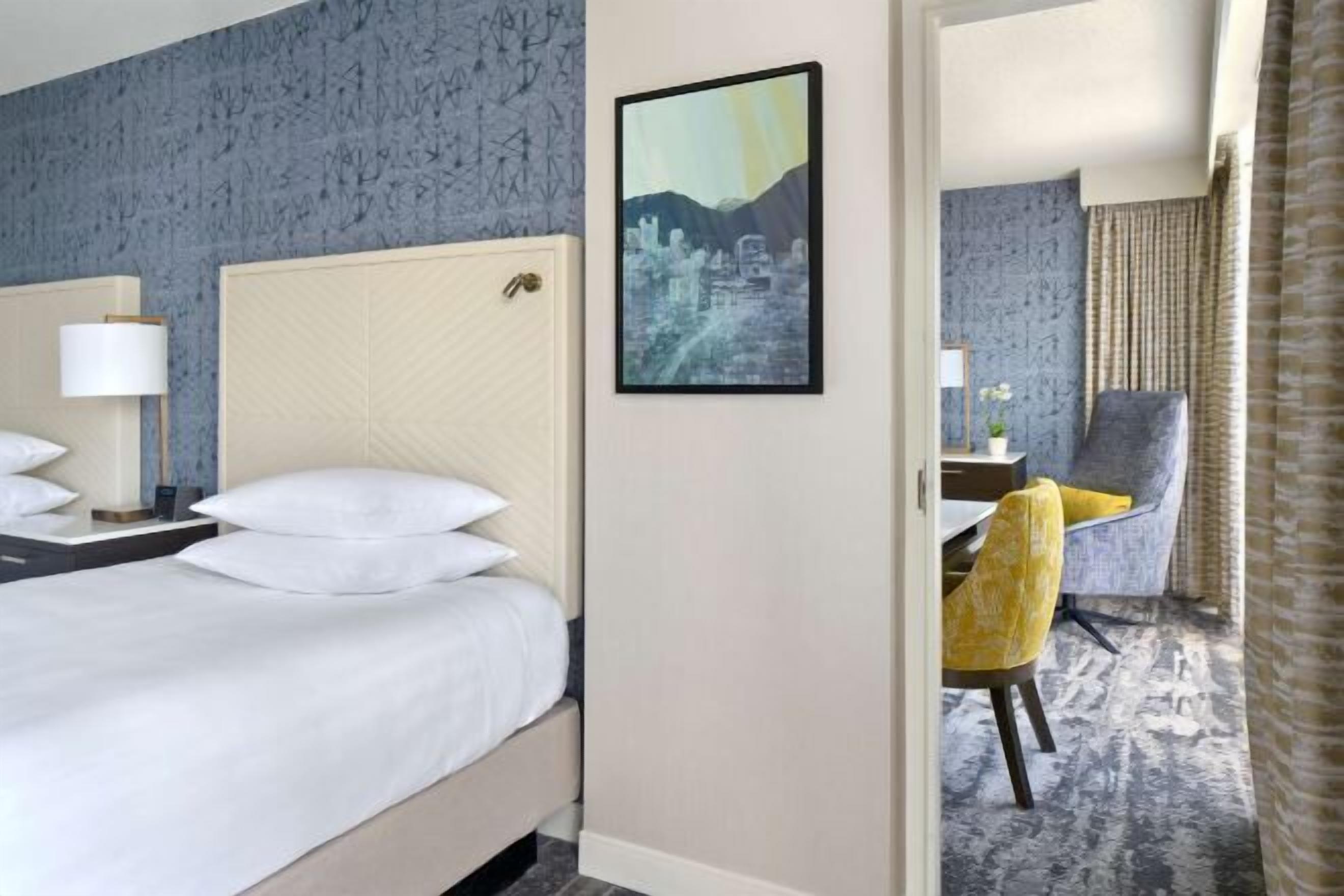 Premium bedding, down comforters, pillowtop beds, in-room safe