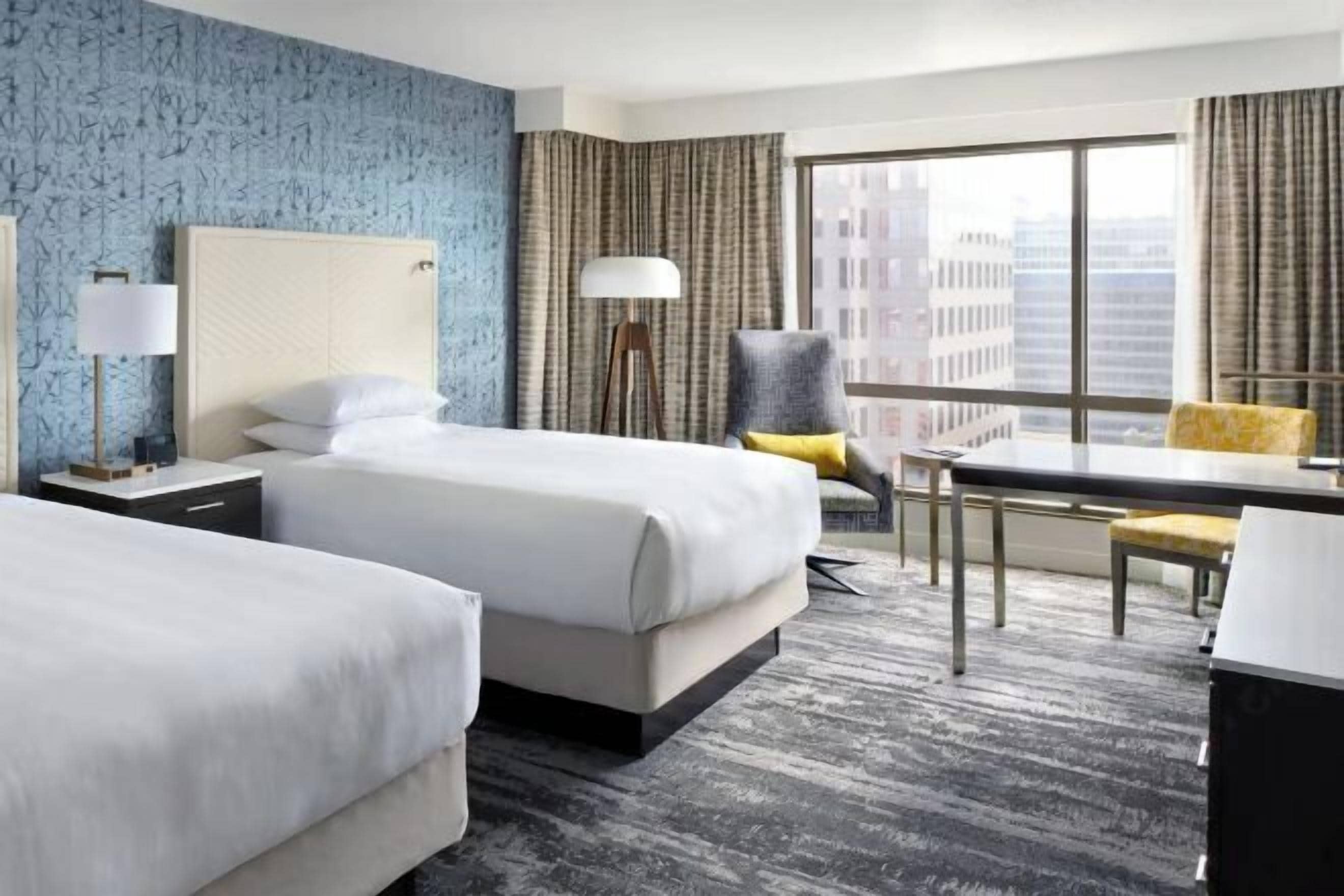 Premium bedding, down comforters, pillowtop beds, in-room safe