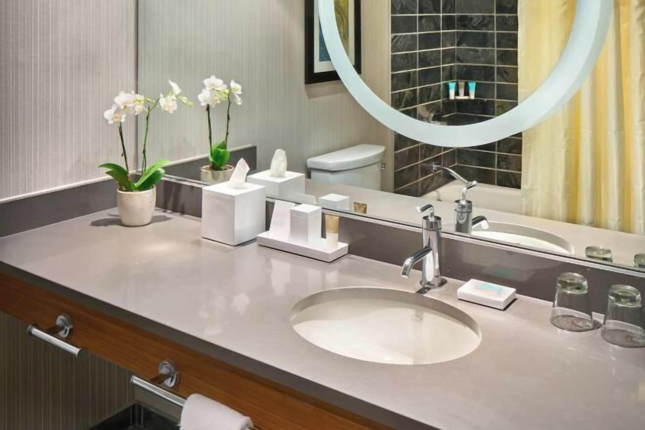 Combined shower/tub, designer toiletries, hair dryer, bathrobes