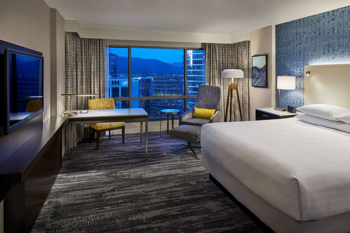 Premium bedding, down comforters, pillowtop beds, in-room safe