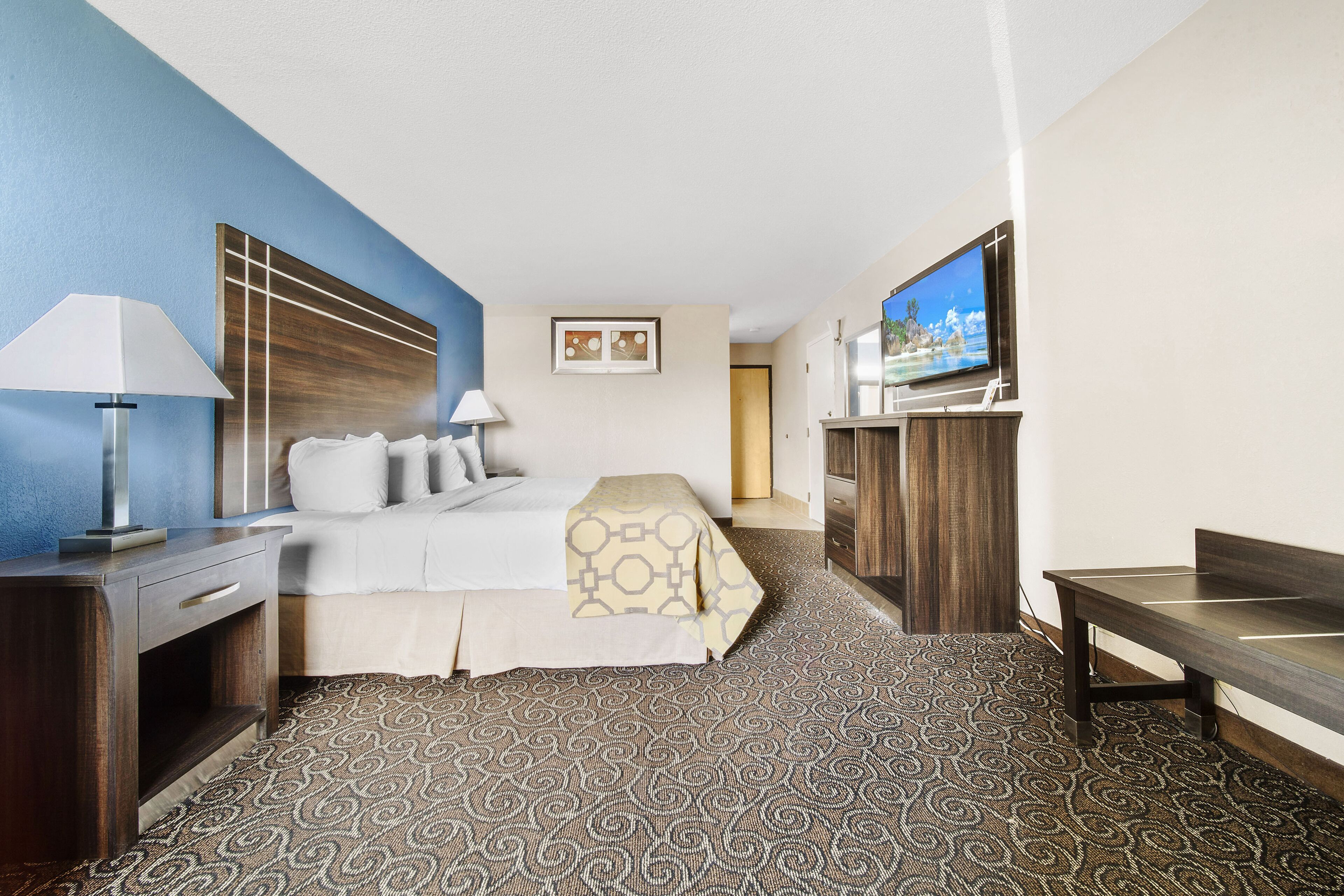 Pillowtop beds, desk, blackout drapes, iron/ironing board