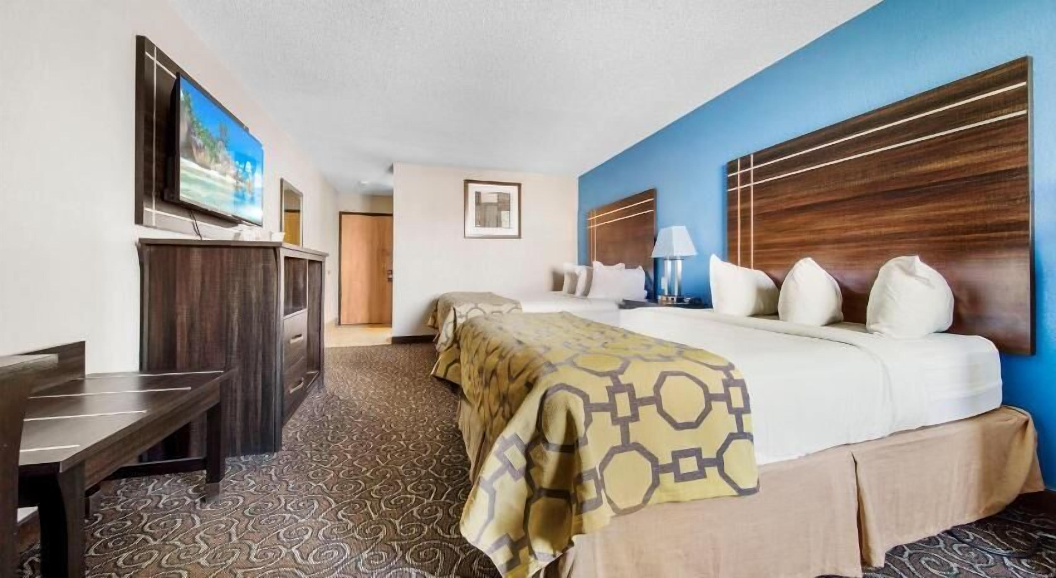 Pillow-top beds, desk, blackout curtains, iron/ironing board