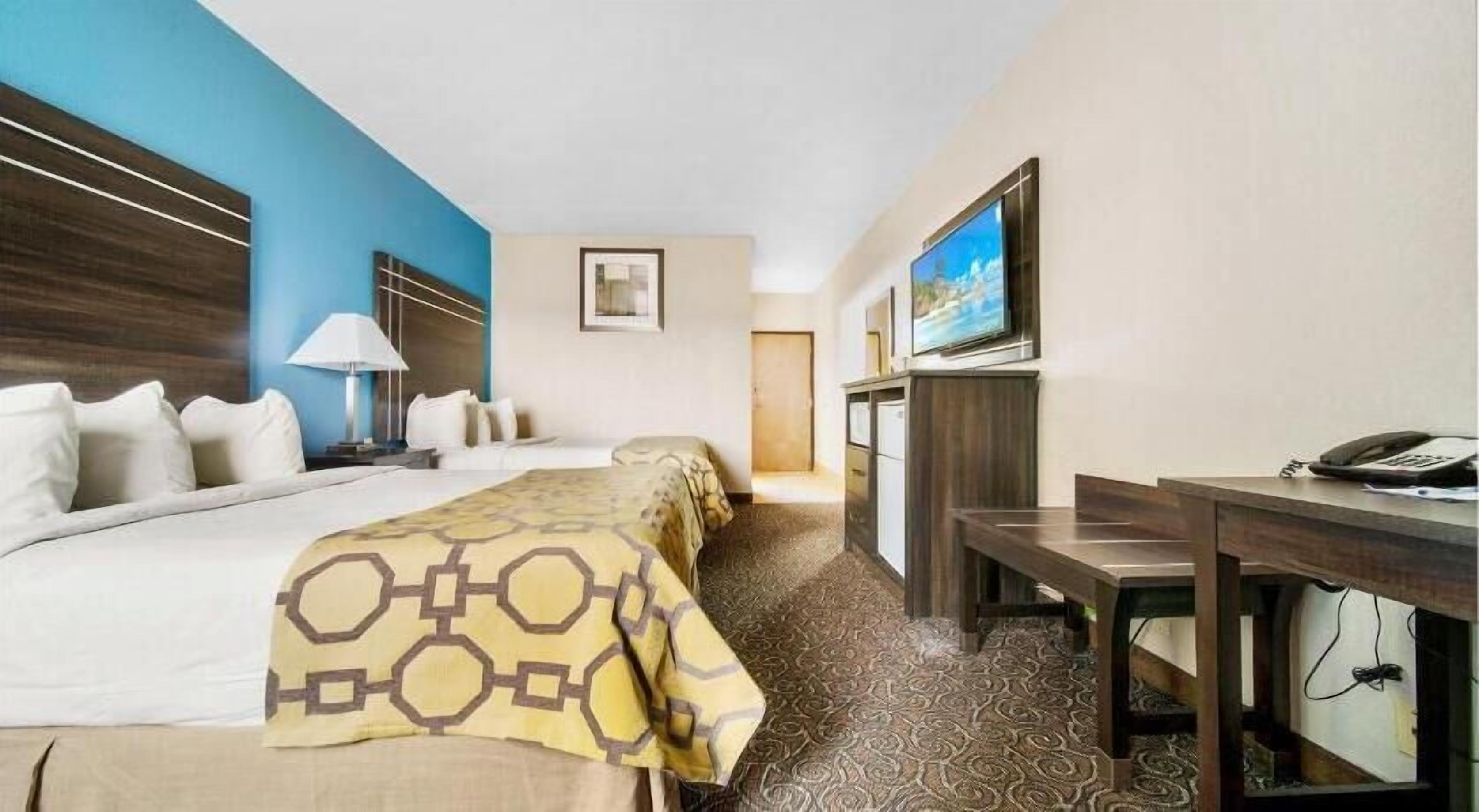 Pillow-top beds, desk, blackout curtains, iron/ironing board