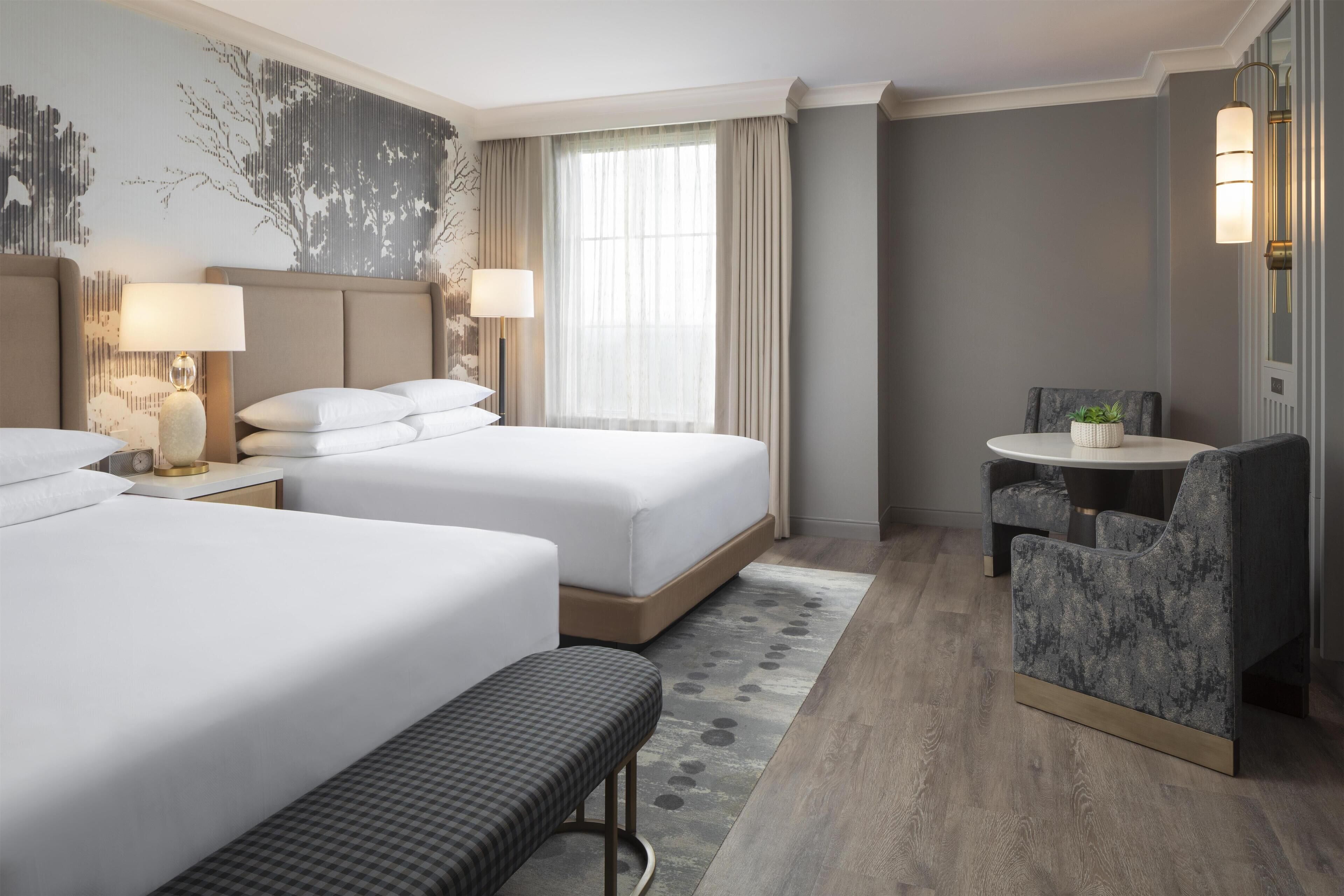 Premium bedding, down duvets, pillow-top beds, in-room safe