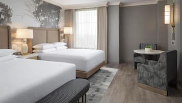Premium bedding, down comforters, pillowtop beds, in-room safe