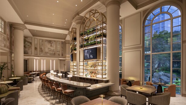 A spacious bar area with a high ceiling, large windows, and a variety of seating arrangements including bar stools and tables. - Grand Hyatt Atlanta in Buckhead (Atlanta)