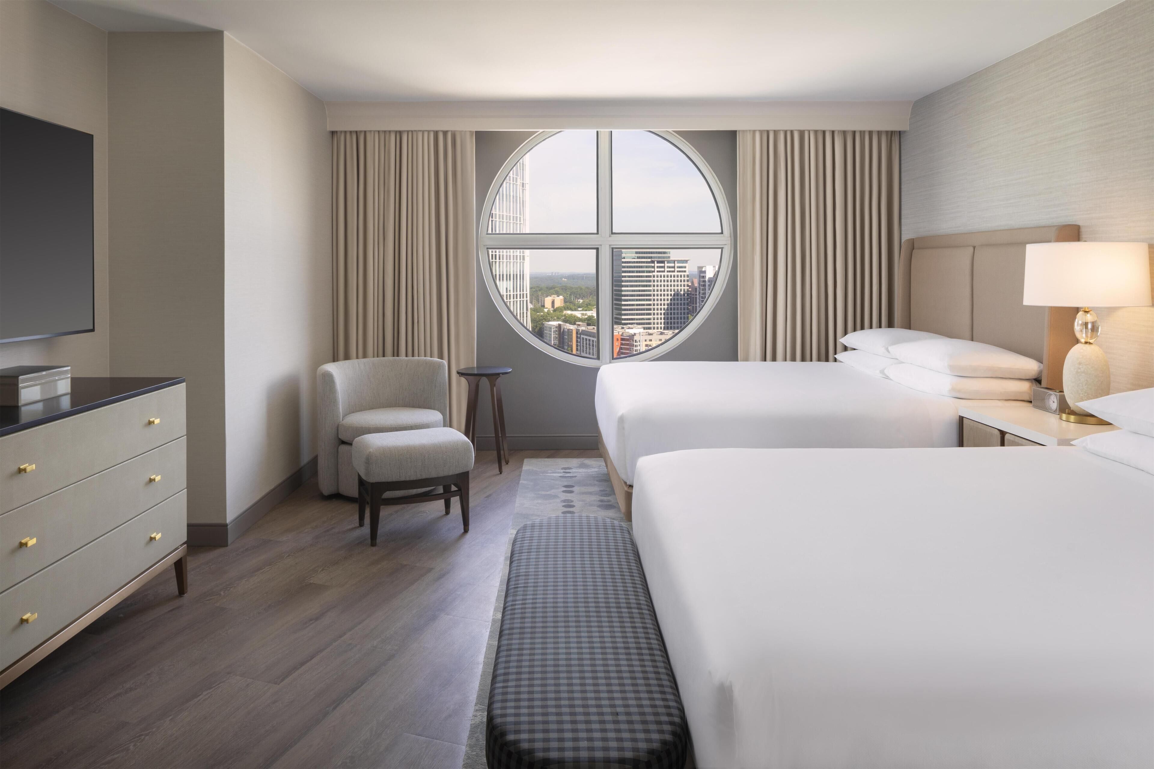 Premium bedding, down duvets, pillow-top beds, in-room safe