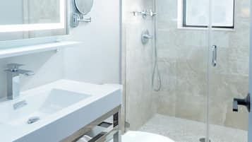 Shower, rainfall showerhead, designer toiletries, hair dryer