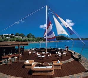 2 bars/lounges, poolside bar, beach bar