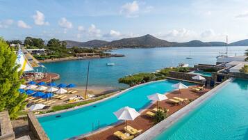 Indoor pool, seasonal outdoor pool, pool umbrellas, sun loungers