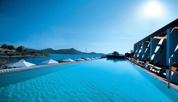 Indoor pool, seasonal outdoor pool, pool umbrellas, sun loungers
