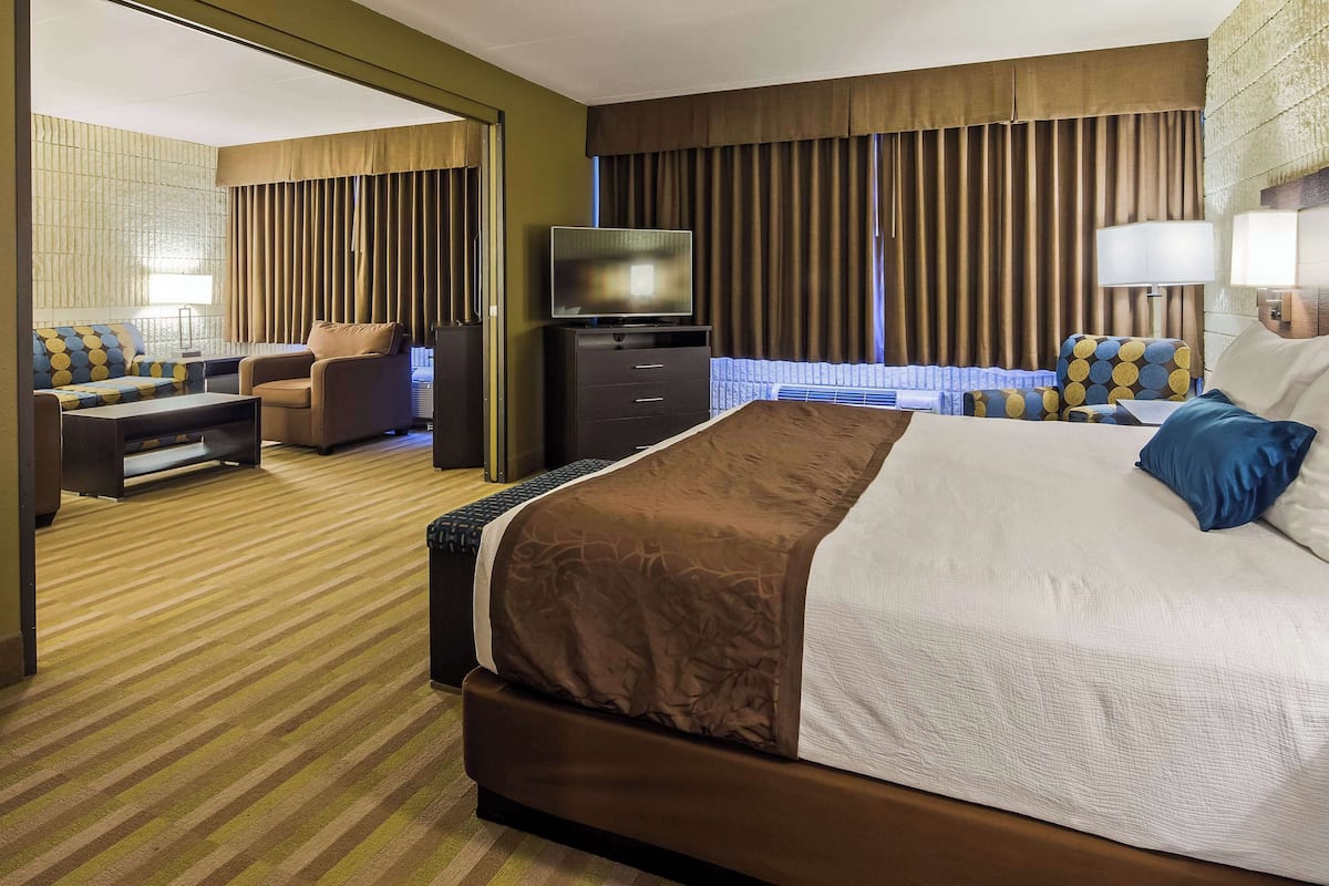 suite, 1 king bed, non smoking | desk, iron/ironing board, free cots/infant beds, bed sheets