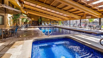 Indoor pool, open 8:00 AM to 10:00 PM, pool loungers