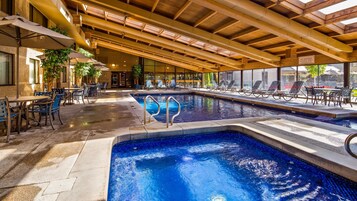 Indoor pool, open 8:00 AM to 10:00 PM, pool loungers