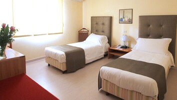 Superior Double or Twin Room | Minibar, in-room safe, desk, laptop workspace