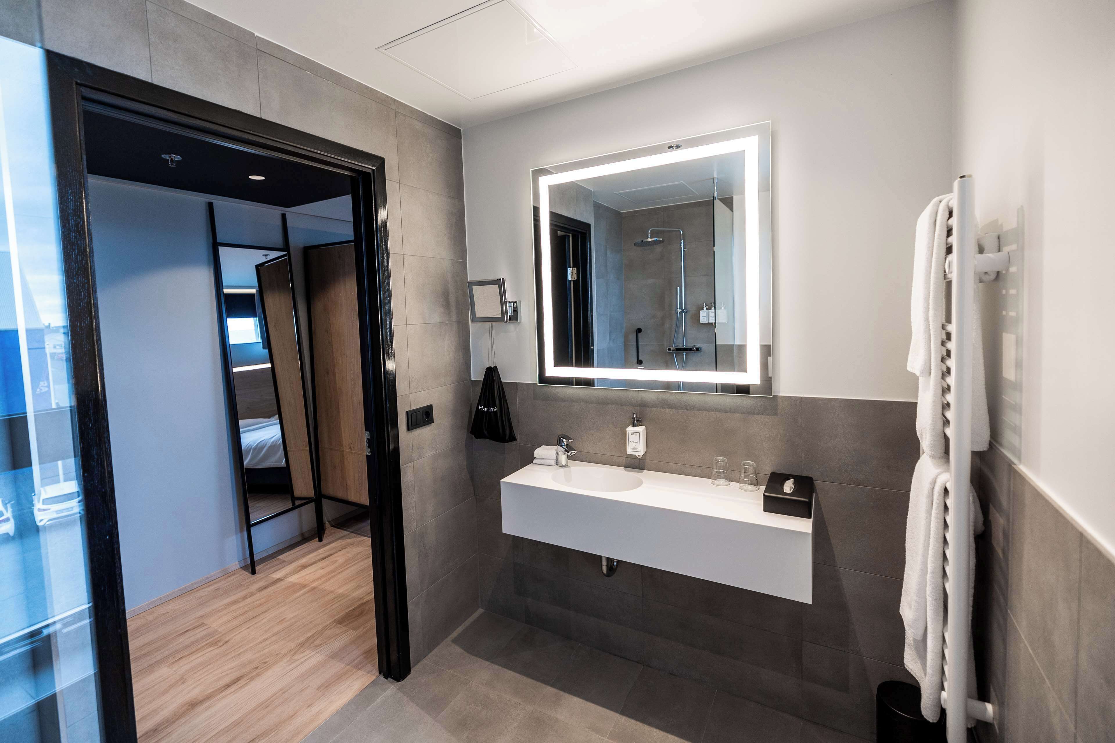 superior room | bathroom | shower, eco-friendly toiletries, hair dryer, towels