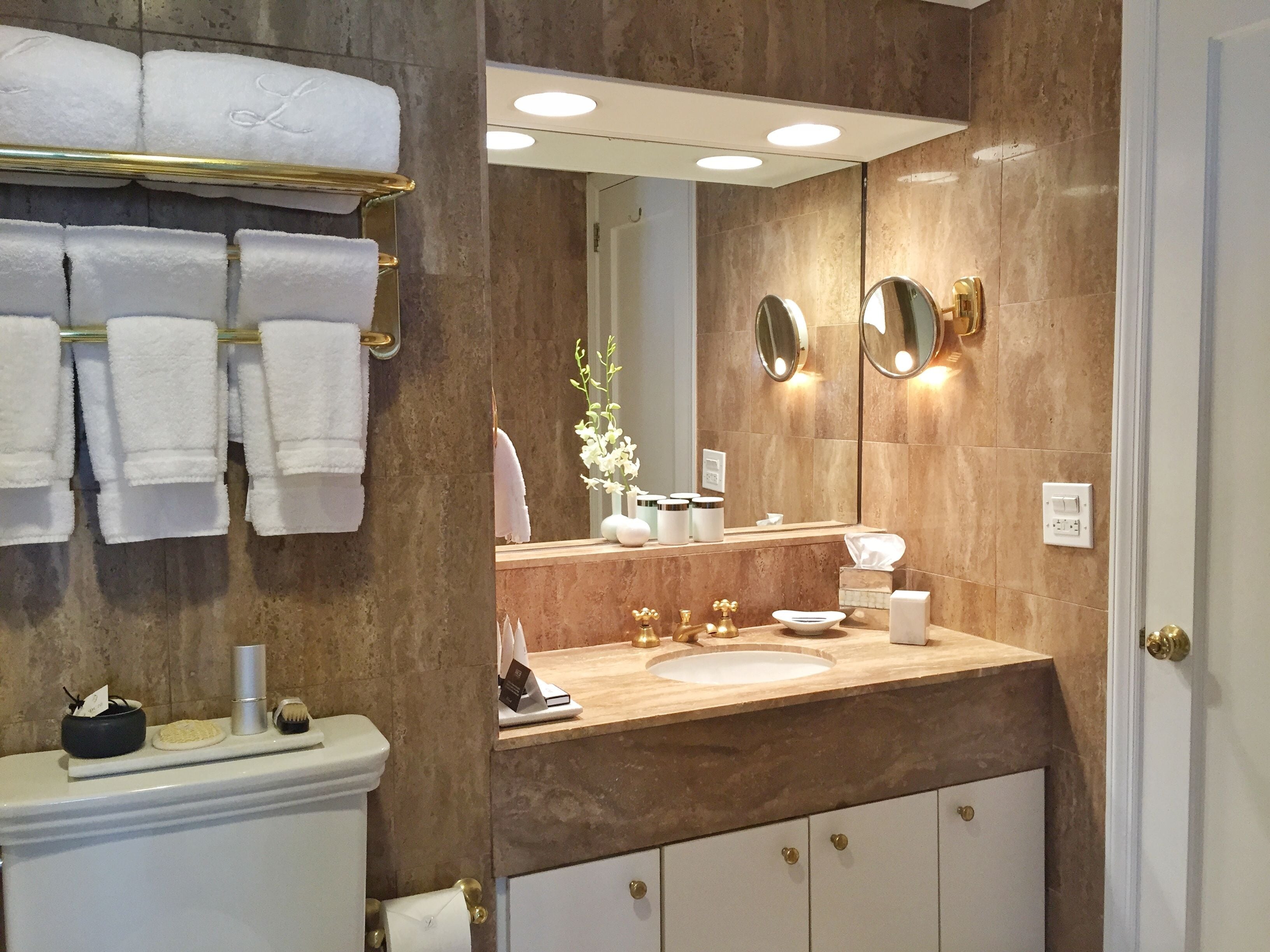 bathtub, designer toiletries, hair dryer, bathrobes