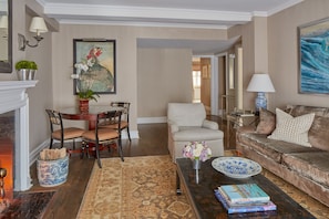 Suite, 2 Bedrooms (Lowell) | Living area | Flat-screen TV, iPod dock, pay movies