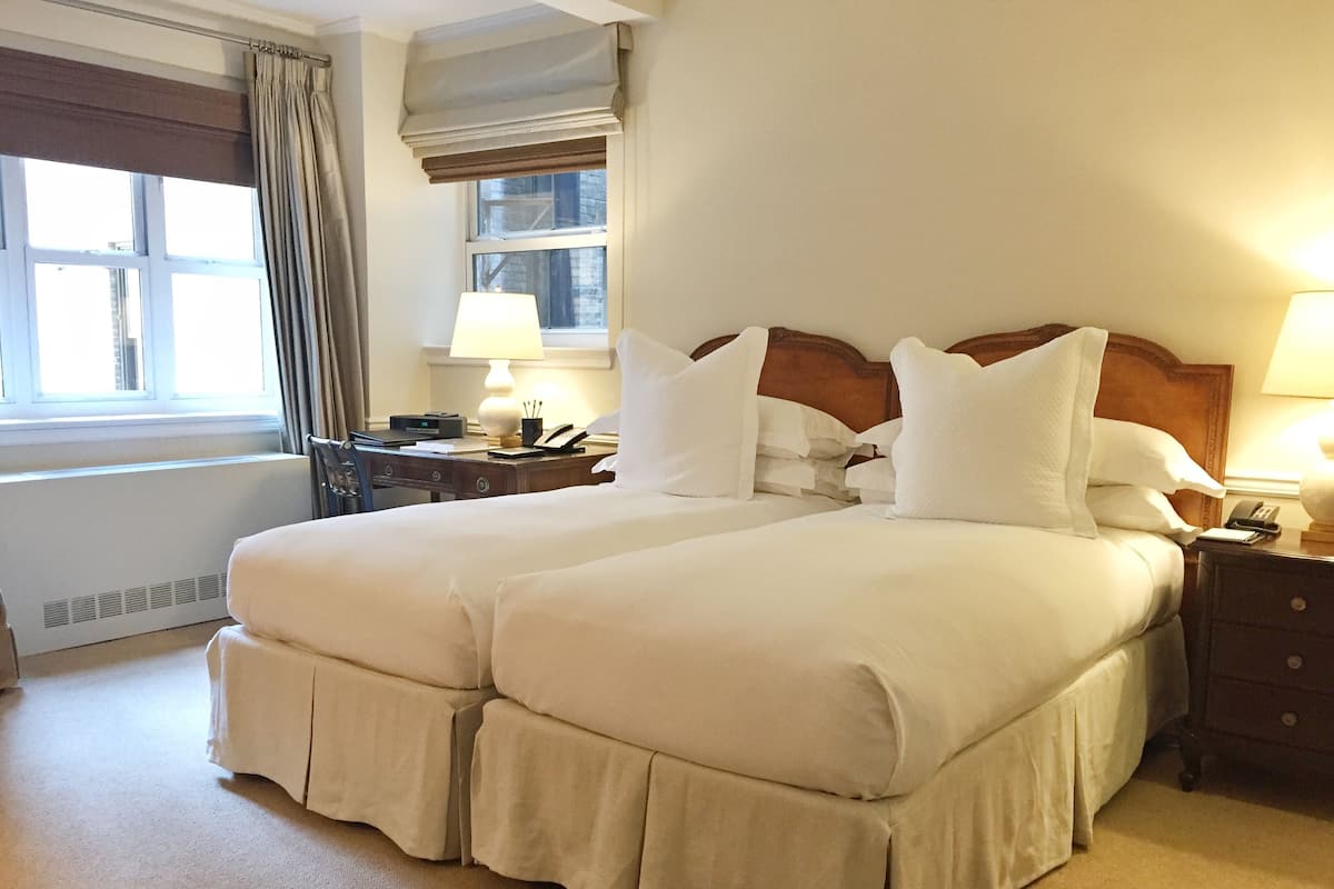 Frette Italian sheets, premium bedding, down duvets, minibar