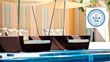 Outdoor pool, open 7:00 AM to 7:00 PM, free pool cabanas, pool umbrellas
