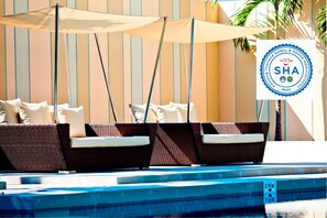 Outdoor pool, open 7:00 AM to 7:00 PM, free pool cabanas, pool umbrellas