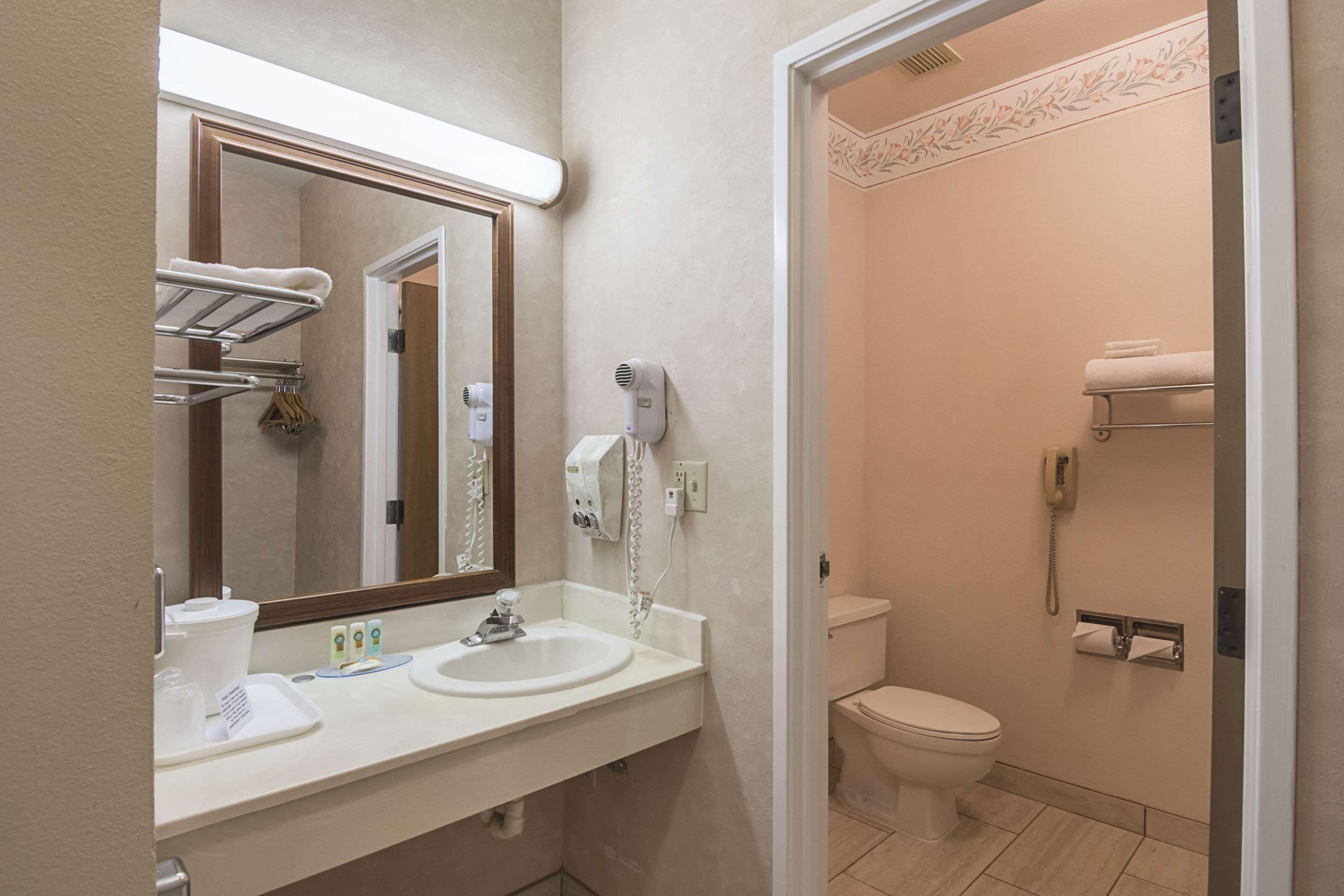 shower, eco-friendly toiletries, hair dryer, towels