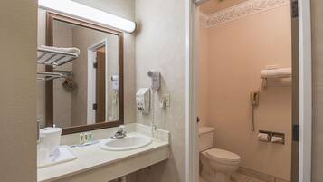 Shower, eco-friendly toiletries, hair dryer, towels
