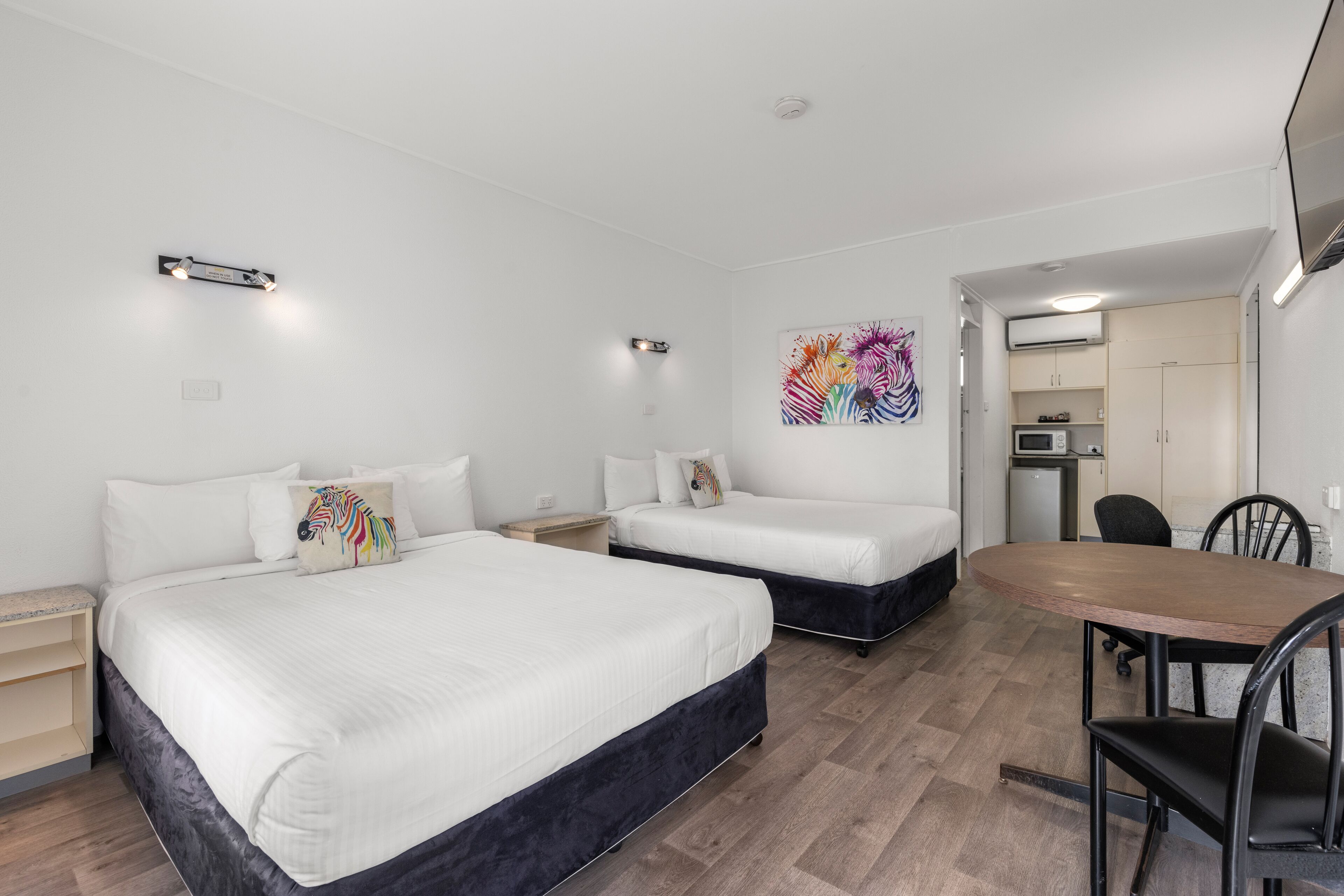 premium bedding, desk, laptop workspace, blackout curtains