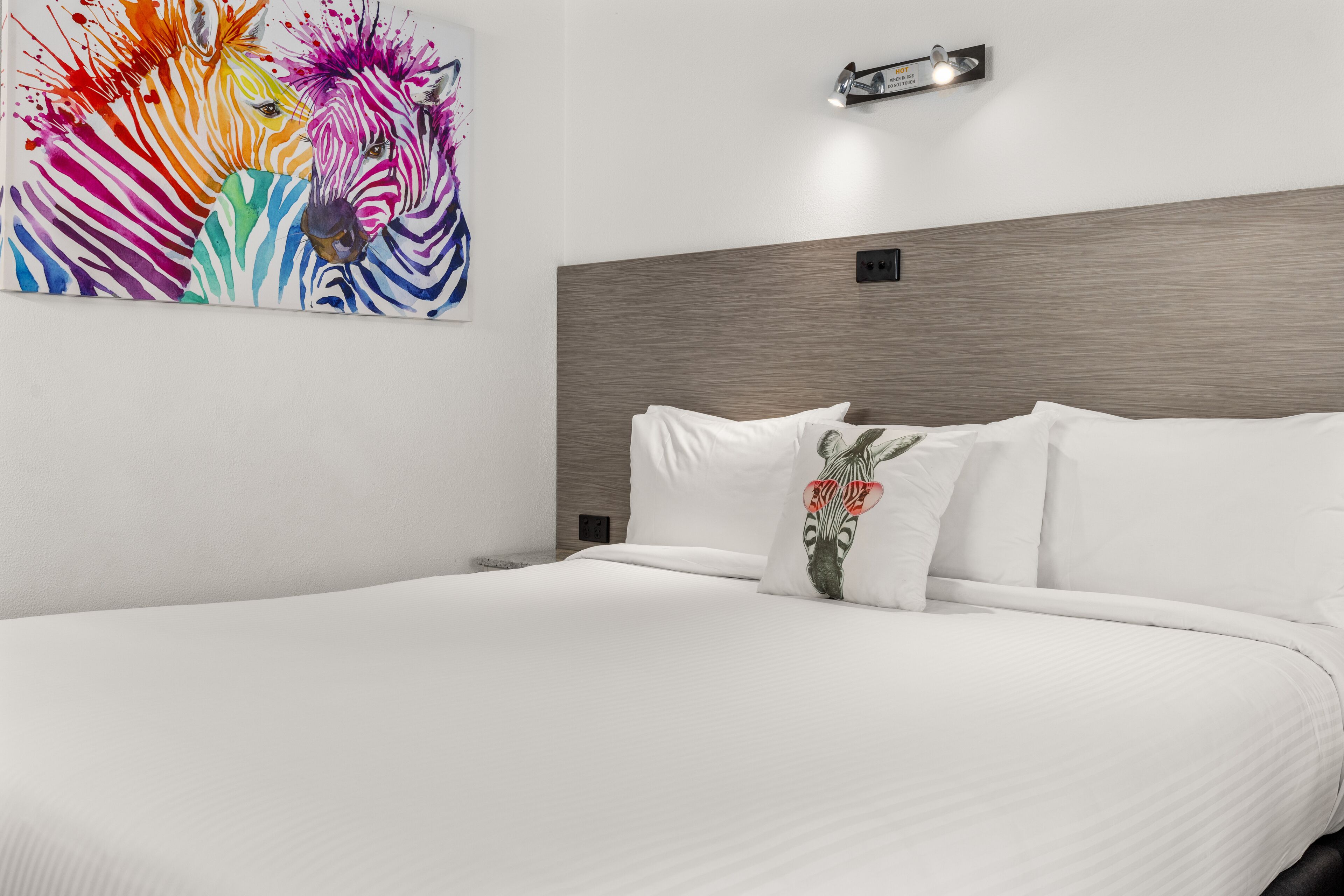 premium bedding, desk, laptop workspace, blackout curtains