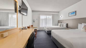 Deluxe Room, 2 Queen Beds, Non Smoking, Private Bathroom | Premium bedding, desk, laptop workspace, blackout curtains