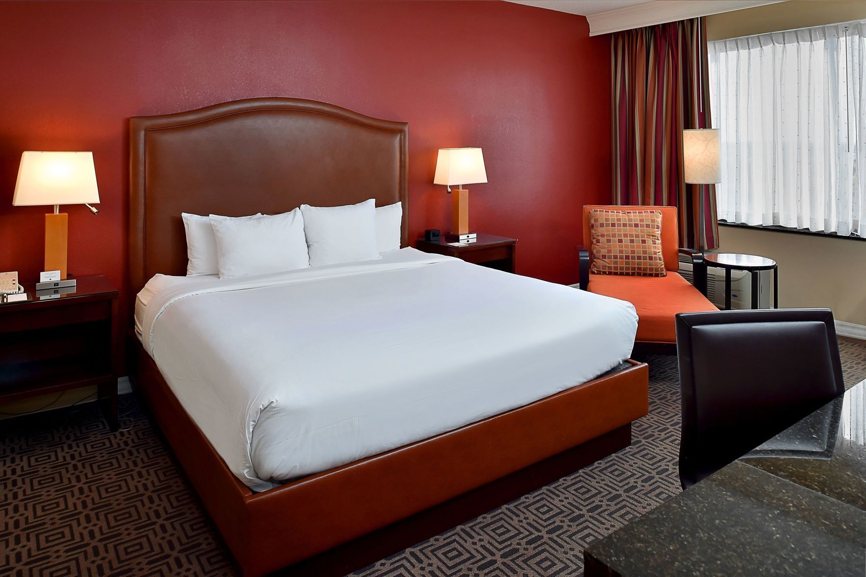 Premium bedding, down comforters, in-room safe, desk
