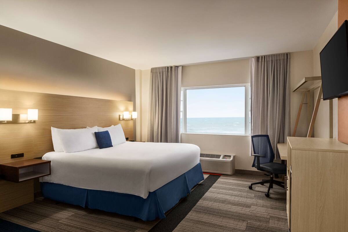 In-room safe, desk, blackout curtains, iron/ironing board