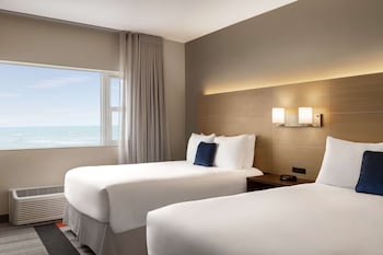 In-room safe, desk, blackout drapes, iron/ironing board at Lexington by Hotel RL Miami Beach