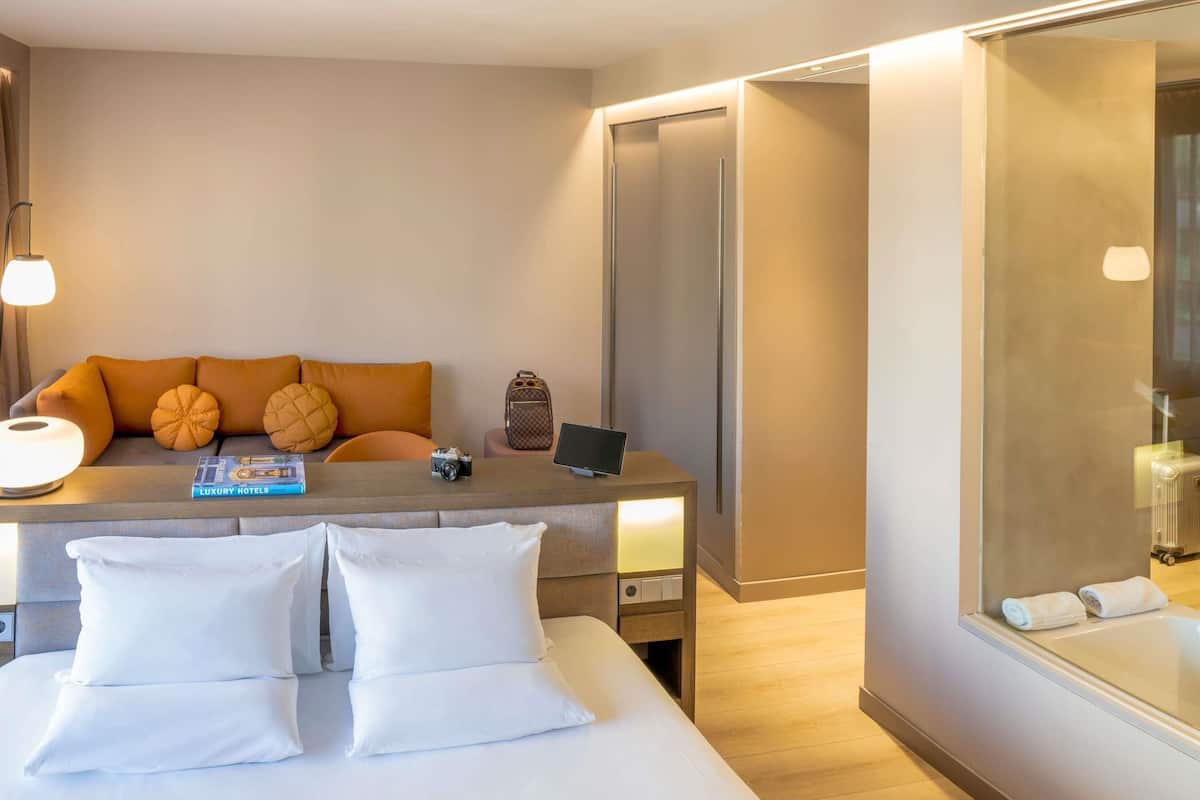 Junior Suite, 1 Queen Bed with Sofa bed | Premium bedding, in-room safe, desk, laptop workspace