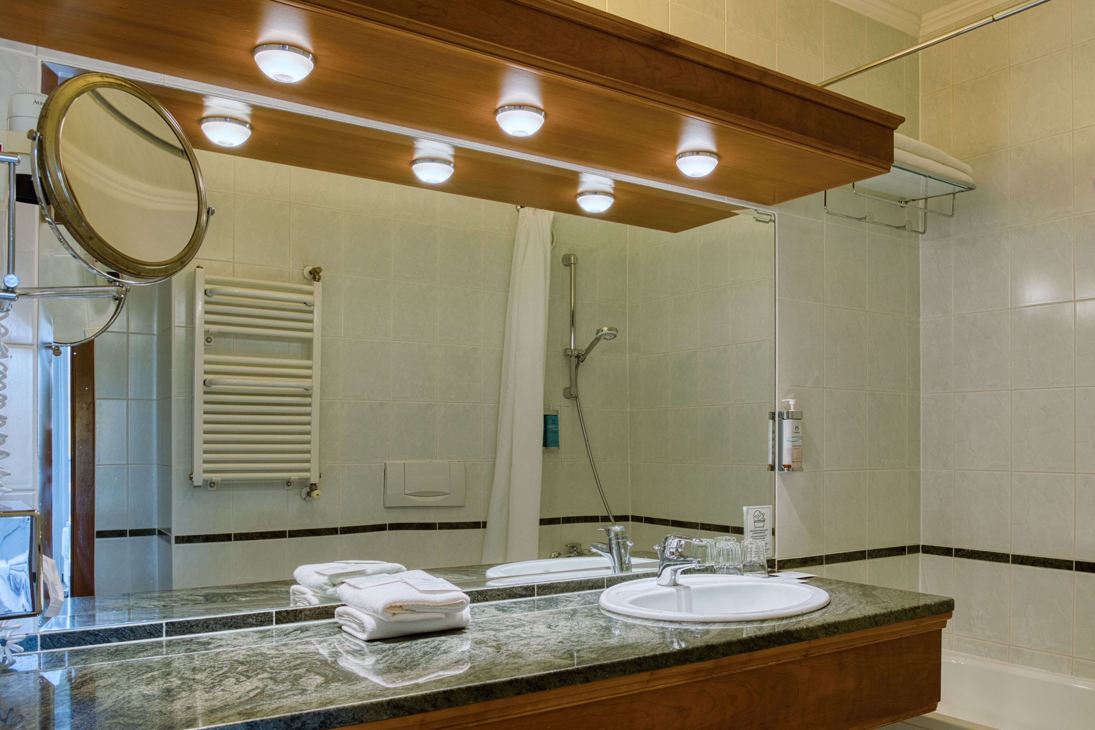 combined shower/bathtub, eco-friendly toiletries, hair dryer, bathrobes