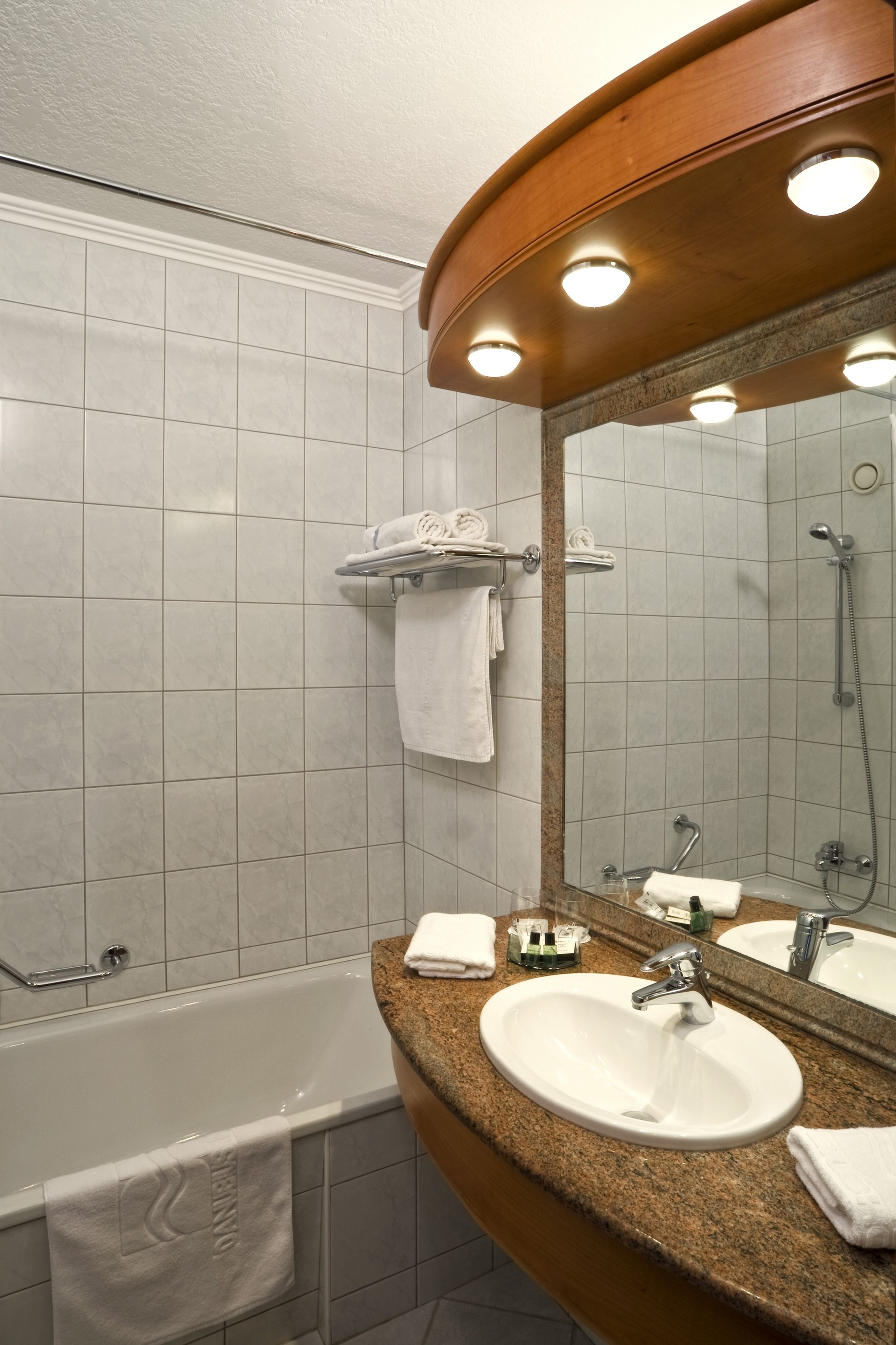 combined shower/bathtub, eco-friendly toiletries, hair dryer, bathrobes