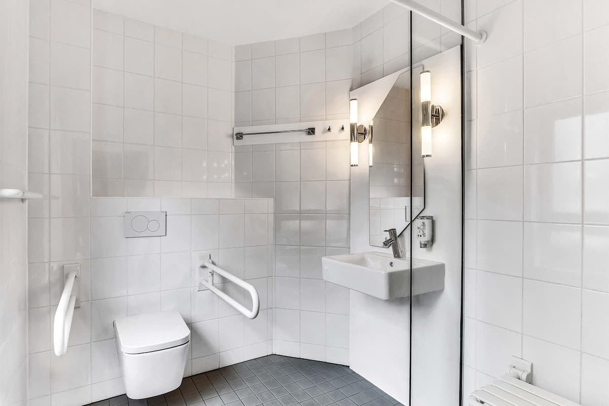 premium double room | bathroom | shower, hair dryer, towels, soap