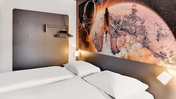 Desk, blackout curtains, soundproofing, free WiFi