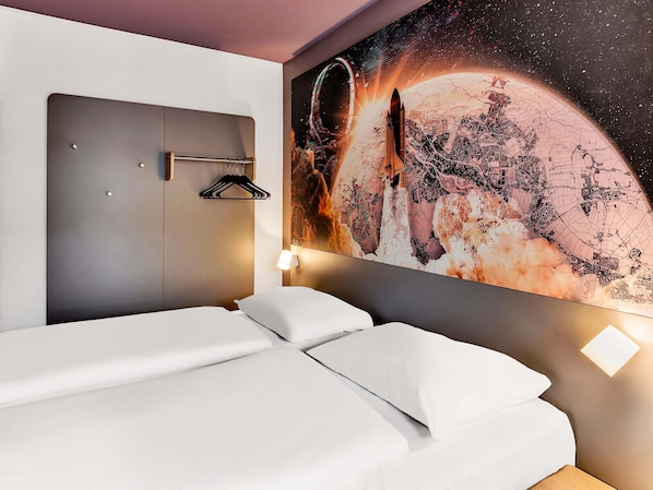 Desk, blackout curtains, soundproofing, free WiFi