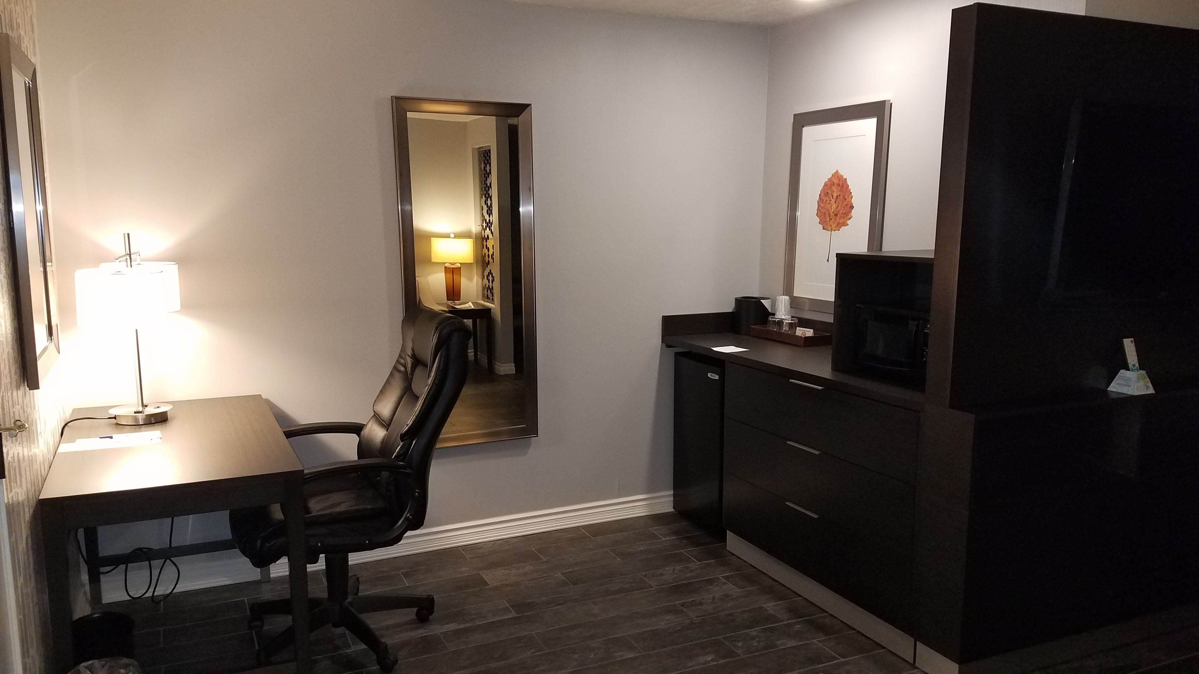 suite, 1 king bed, non smoking, refrigerator & microwave (pet friendly;with sofabed) | living area | lcd tv