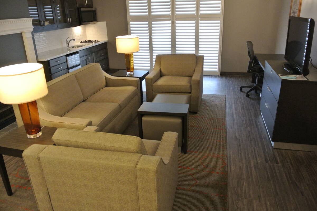 suite, 2 queen beds, non smoking, fireplace (third bed is a sofabed) | hypo-allergenic bedding, in-room safe, desk, laptop workspace