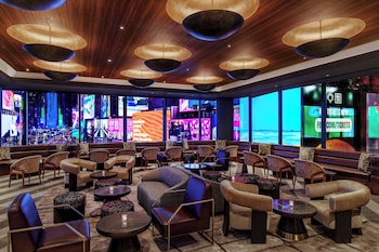 Lounge at Renaissance New York Times Square Hotel by Marriott