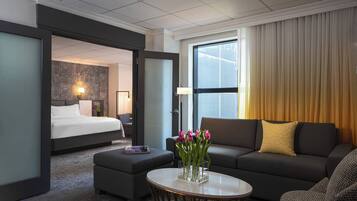 Executive Suite, 1 Bedroom, City View | Living area | 55-inch flat-screen TV with satellite channels, TV, pay films