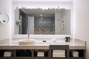 Shower, designer toiletries, hair dryer, towels