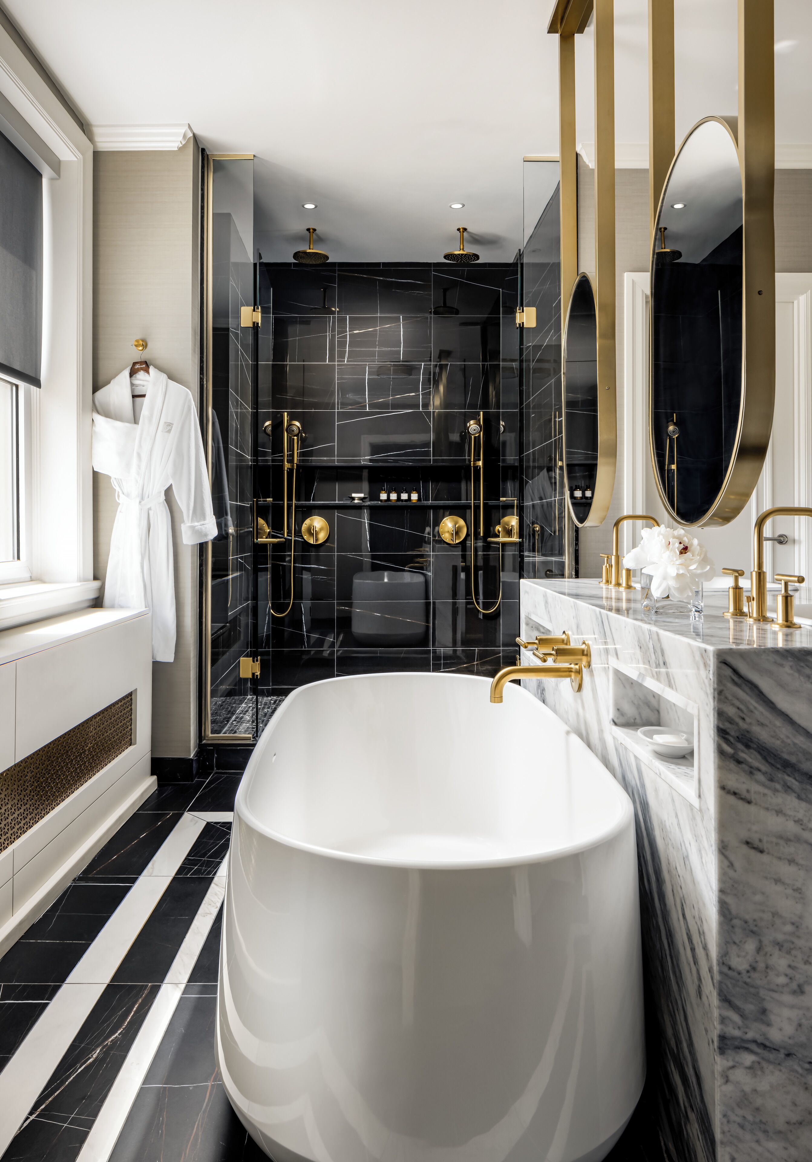 presidential suite, 1 king bed | bathroom | combined shower/bathtub, designer toiletries, hair dryer, bathrobes